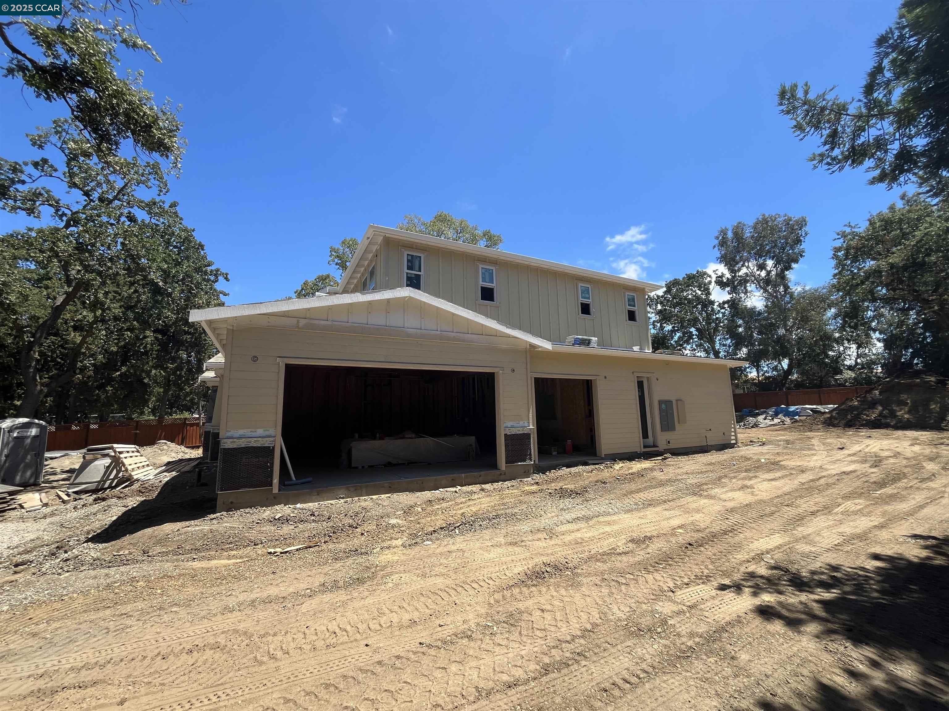 1206 North Gate Road Walnut Creek, CA 94598 - Photo 5 of 9 a view of a house with a snow in the yard