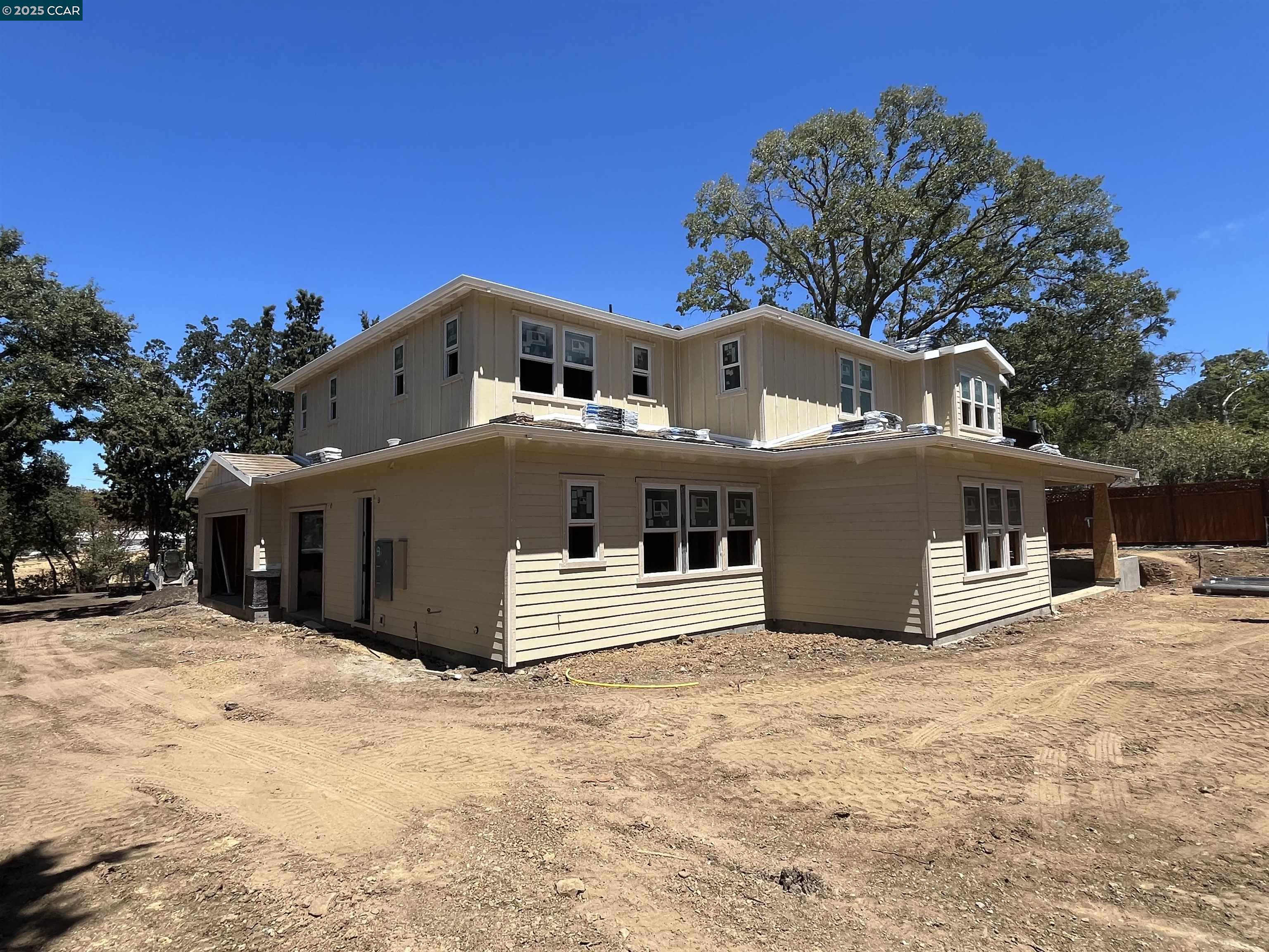 1206 North Gate Road Walnut Creek, CA 94598 - Photo 6 of 9 a front view of a house with a yard