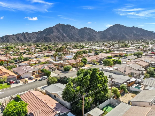 a view of a city with a mountain