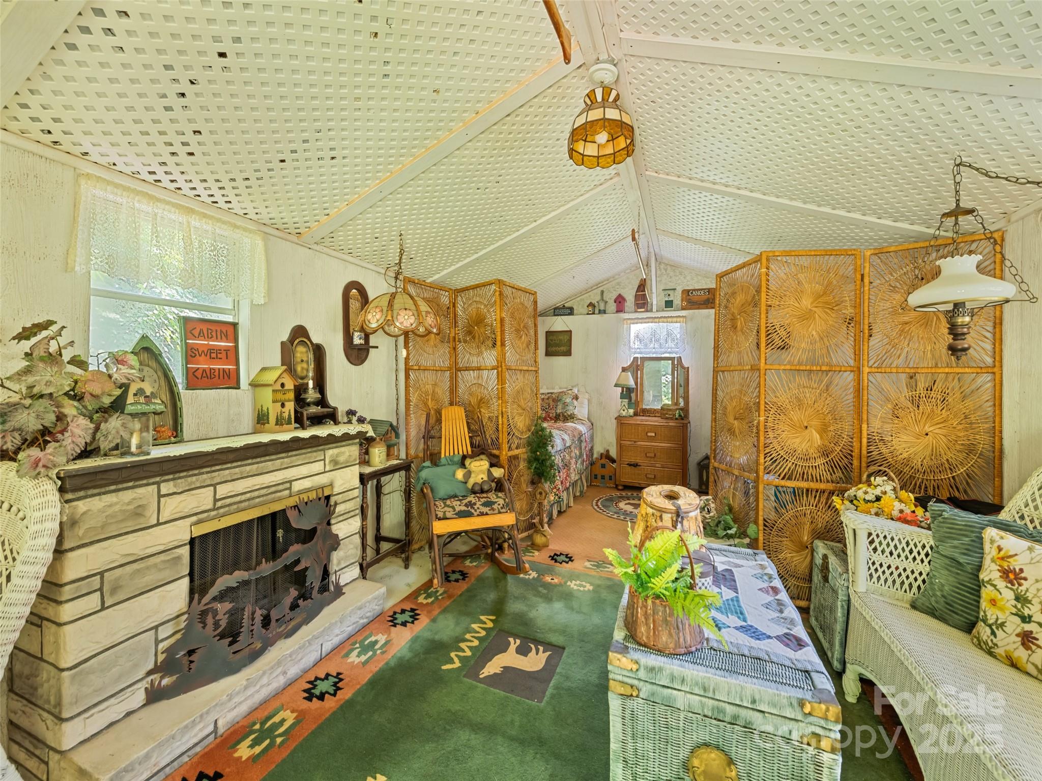 4828 Max Patch Road Clyde, NC 28721 - Photo 18 of 41 a bathroom with a tub sink and mirror