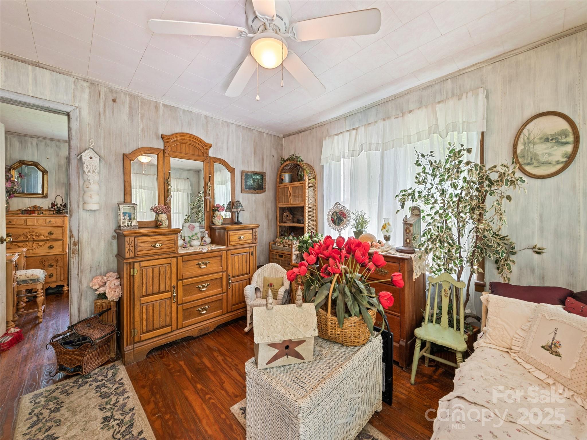 4828 Max Patch Road Clyde, NC 28721 - Photo 28 of 41 a living room with furniture and a chandelier