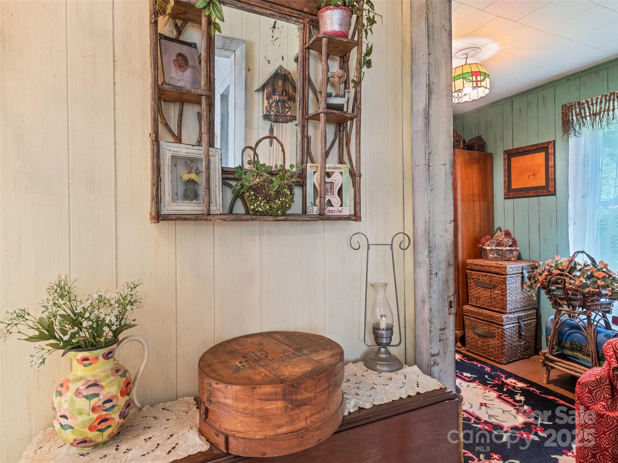 4828 Max Patch Road Clyde, NC 28721 - Photo 34 of 41 a room with table and flowerpot