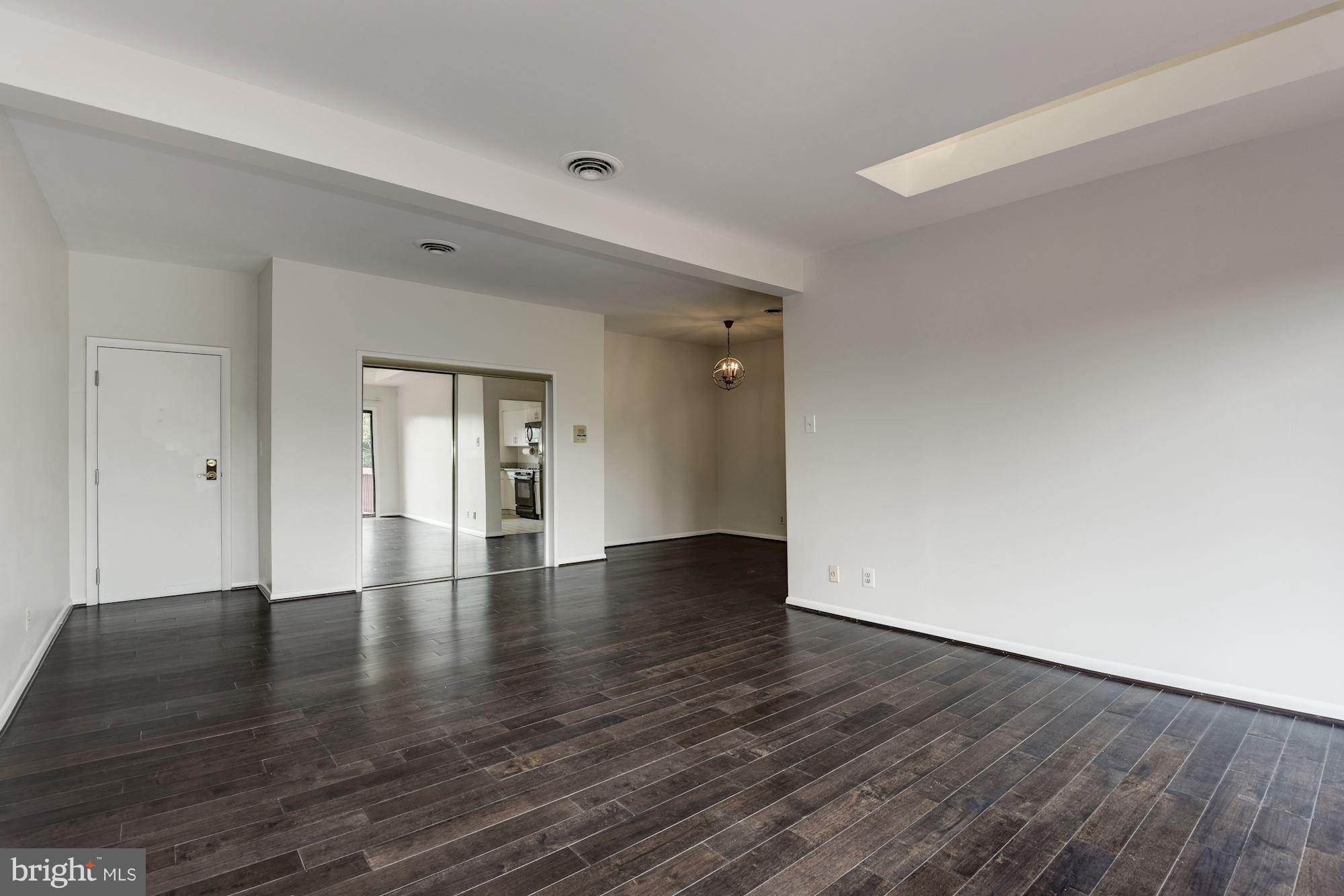 103 Skyhill Road, Unit 8 Alexandria, VA 22314 - Photo 4 of 26 Spacious open living & dining area