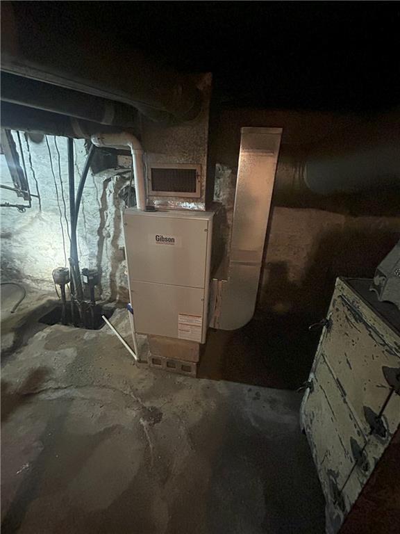 53 Hurd Road Rochester Mills, PA 15771 - Photo 20 of 35 a room with water heater and wooden cabinets