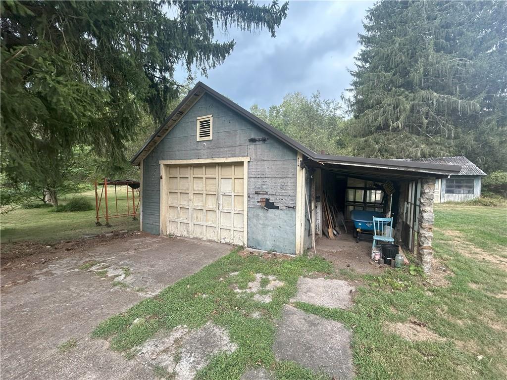 53 Hurd Road Rochester Mills, PA 15771 - Photo 32 of 35 a front view of a house with a yard