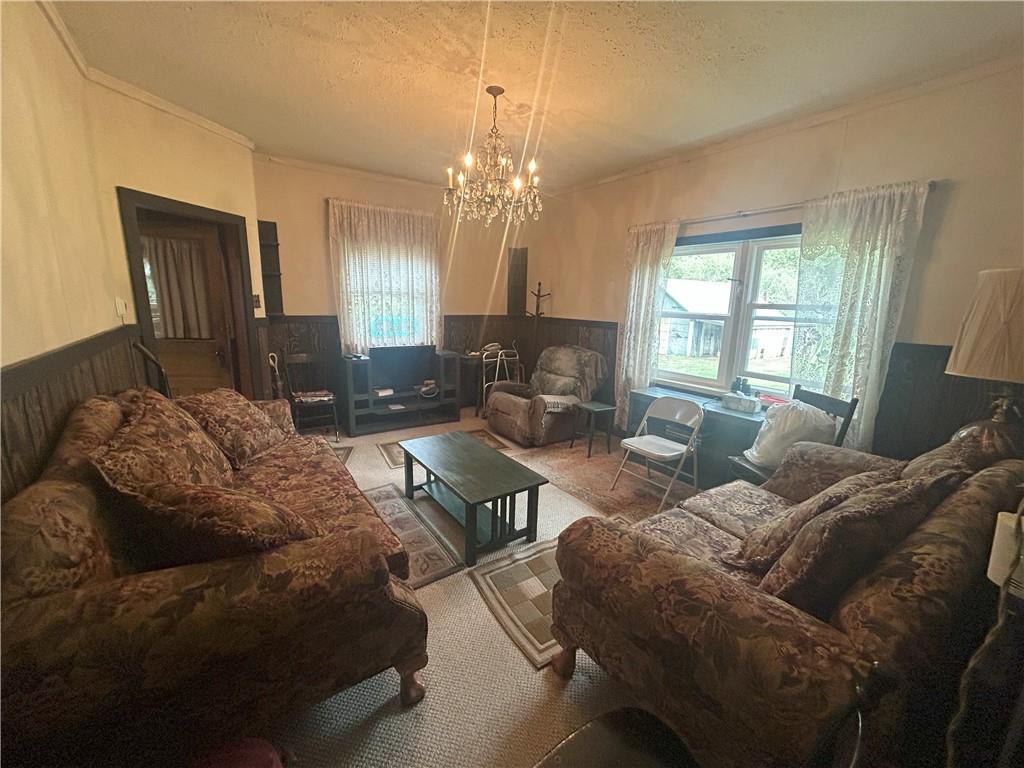 53 Hurd Road Rochester Mills, PA 15771 - Photo 7 of 35 a living room with furniture and a chandelier