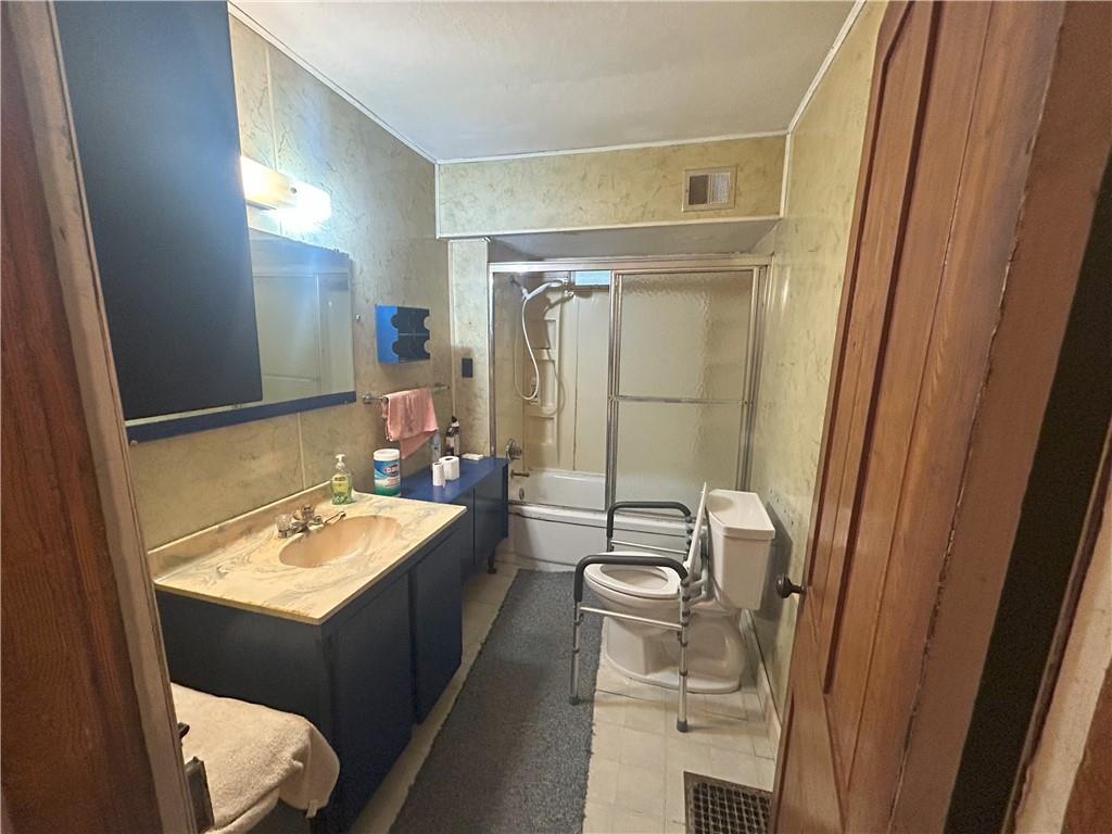 53 Hurd Road Rochester Mills, PA 15771 - Photo 10 of 35 a bathroom with a double vanity sink toilet and mirror