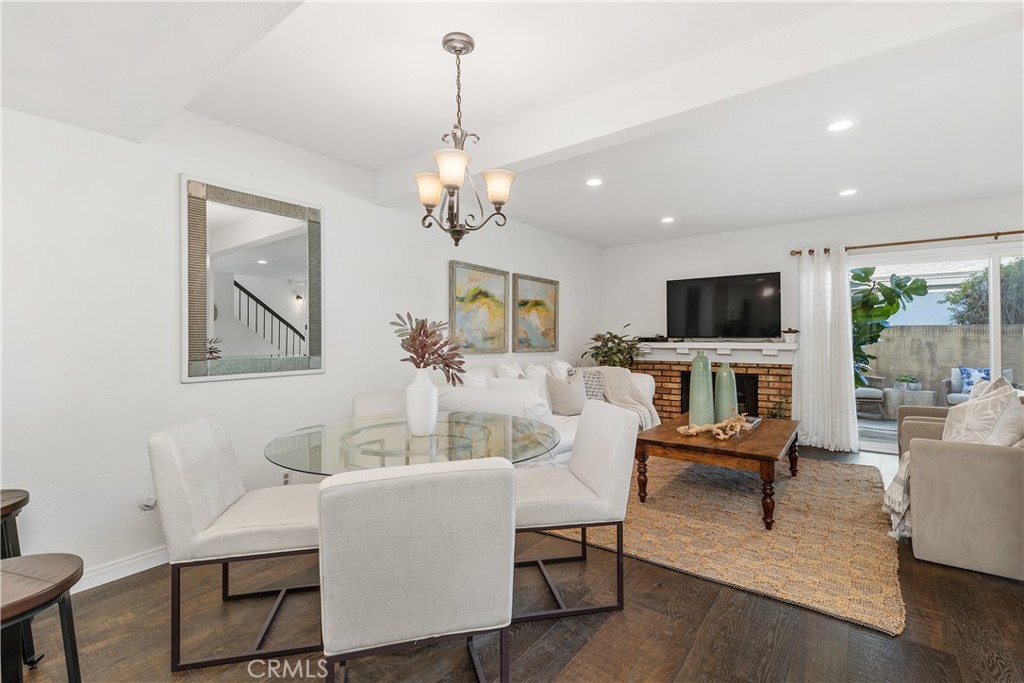 1041 Tustin Pines Way Tustin, CA 92780 - Photo 13 of 32 a view of a livingroom with furniture and a flat screen tv