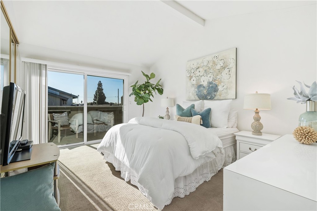 1041 Tustin Pines Way Tustin, CA 92780 - Photo 22 of 32 a bed room with a bed and a television