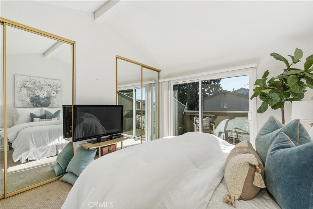 1041 Tustin Pines Way Tustin, CA 92780 - Photo 24 of 32 a bedroom with a bed outdoor view mirror and window