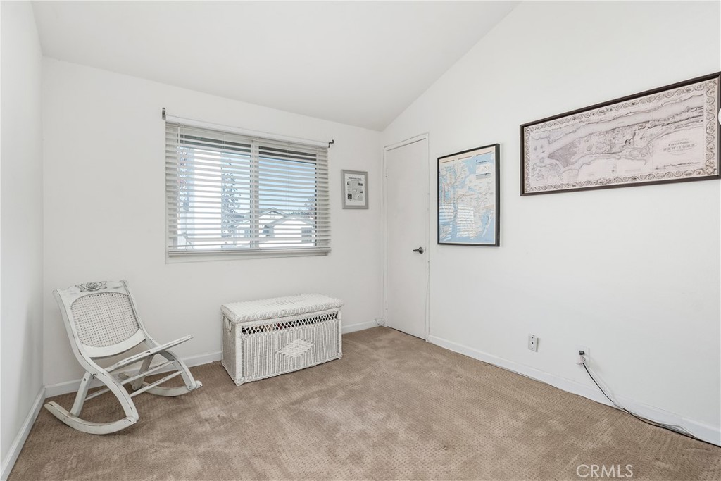 1041 Tustin Pines Way Tustin, CA 92780 - Photo 29 of 32 a living room with furniture and a window