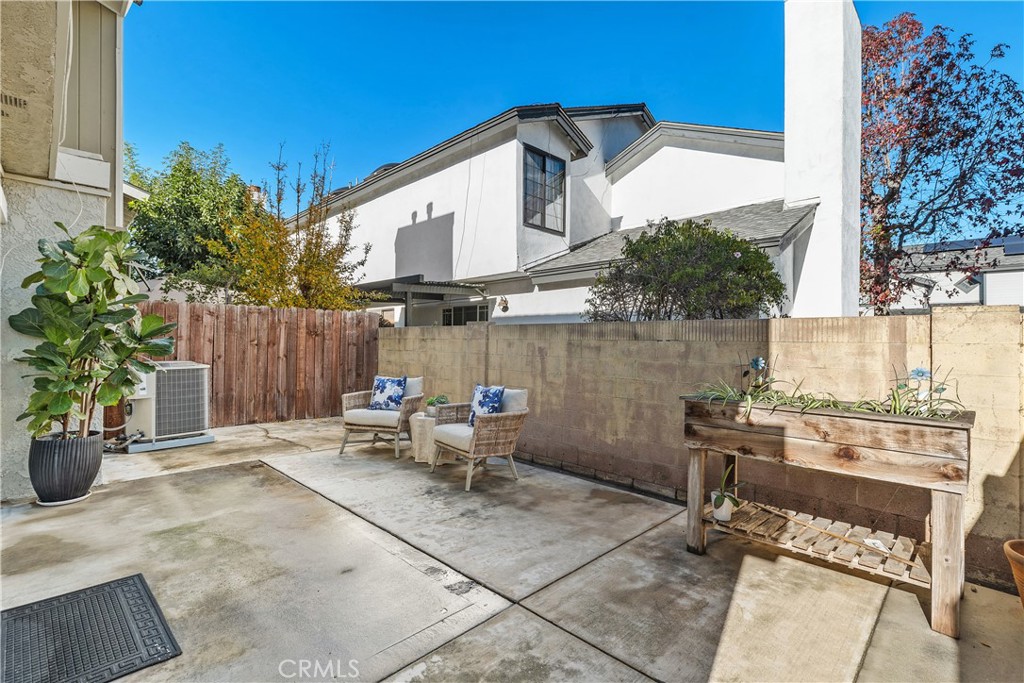 1041 Tustin Pines Way Tustin, CA 92780 - Photo 31 of 32 a backyard of a house with outdoor seating