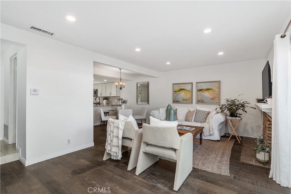 1041 Tustin Pines Way Tustin, CA 92780 - Photo 5 of 32 a living room with furniture and wooden floor