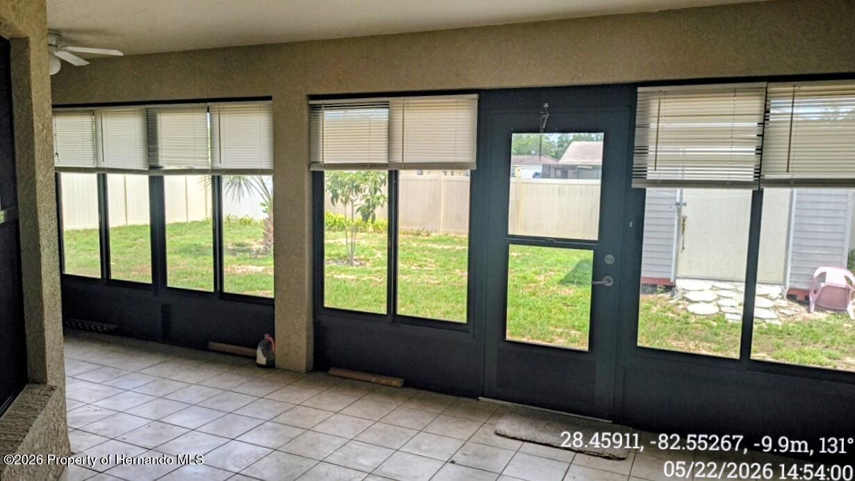 10244 Heathcliff Street Spring Hill, FL 34608 - Photo 25 of 30 a living room with a large window