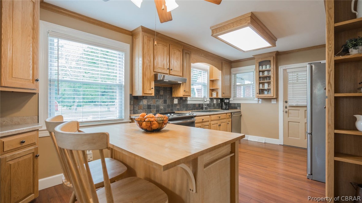 510 Whealton Road Hampton, VA 23666 - Photo 15 of 44 Solid hardwood cabinetry. Island and barstools will convey.