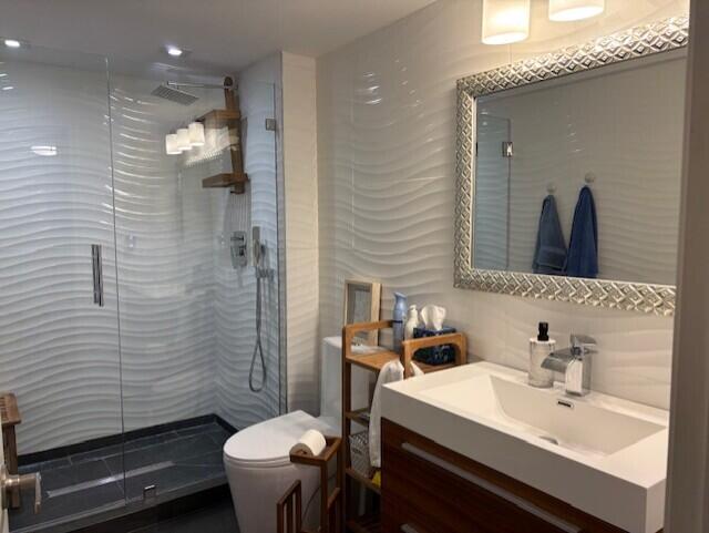 17109 Waterbend Drive, Unit 124 Jupiter, FL 33477 - Photo 8 of 12 guest bath