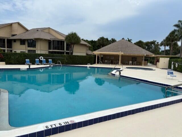 17109 Waterbend Drive, Unit 124 Jupiter, FL 33477 - Photo 9 of 12 heated pool