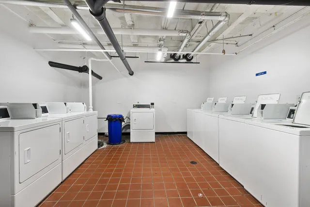 a utility room with cabinets