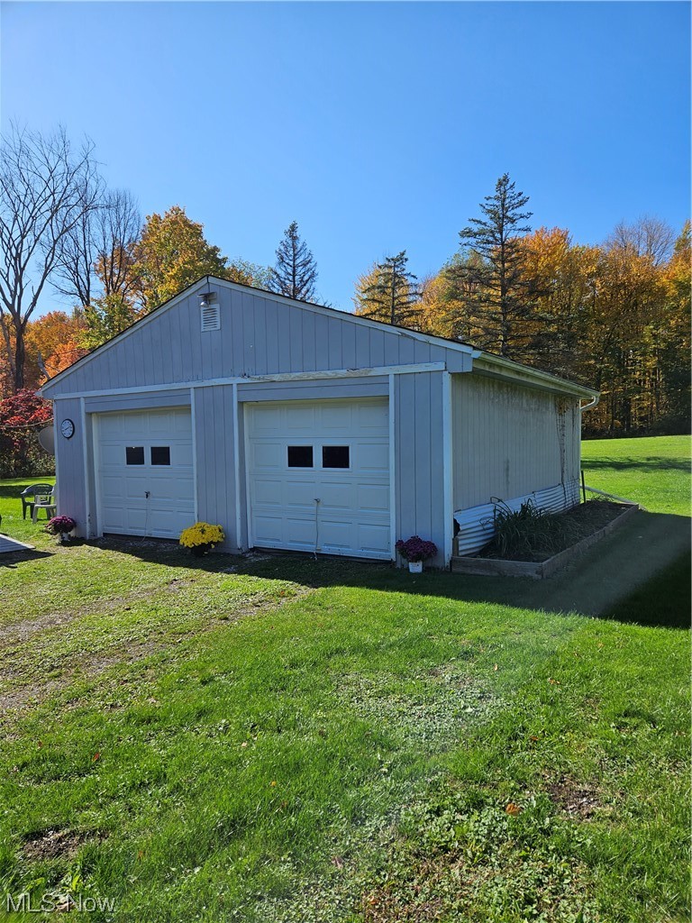 6700 Ledge Road Thompson, OH 44086 - Photo 11 of 15 2 car detached Garage with a large yard