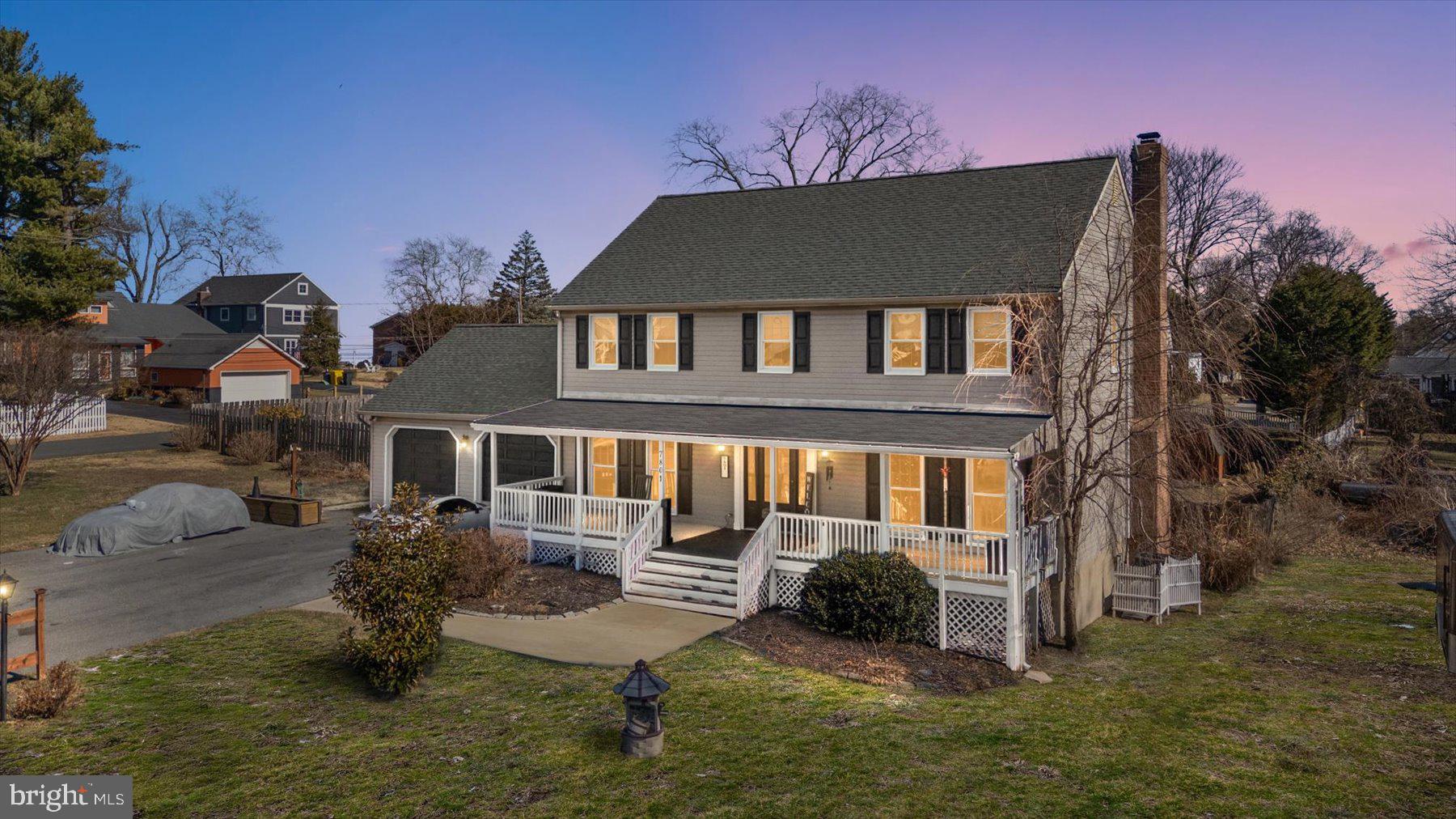 7801 Harle Road Pasadena, MD 21122 - Photo 2 of 64 a front view of a house with garden