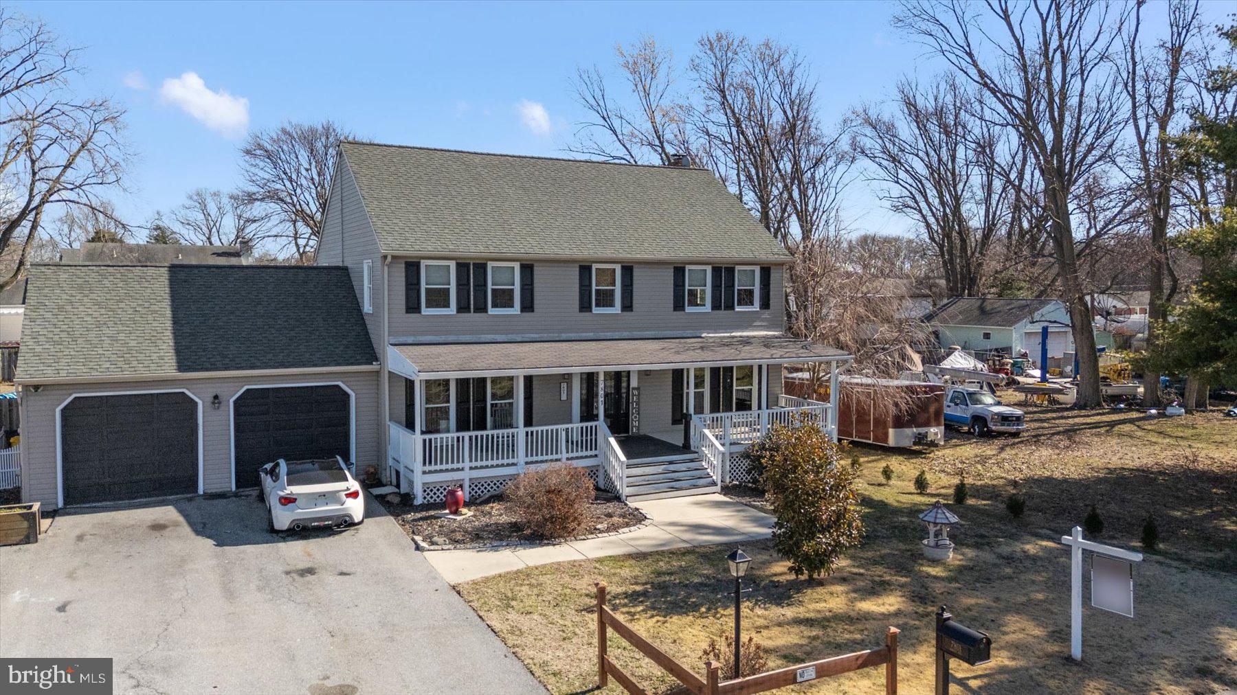 7801 Harle Road Pasadena, MD 21122 - Photo 3 of 64 a view of a house with backyard and sitting area