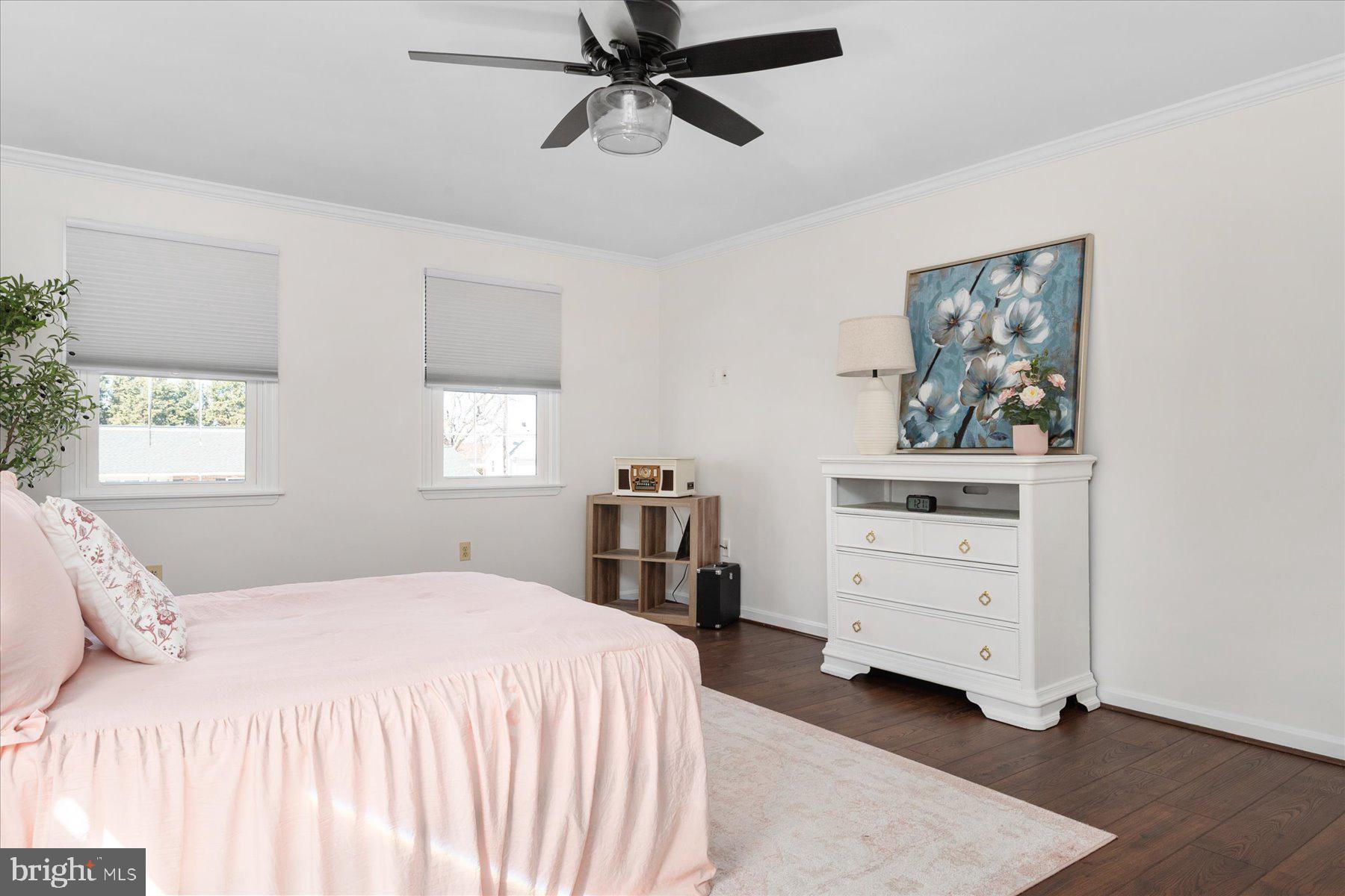 7801 Harle Road Pasadena, MD 21122 - Photo 33 of 64 a bedroom with a bed and a window