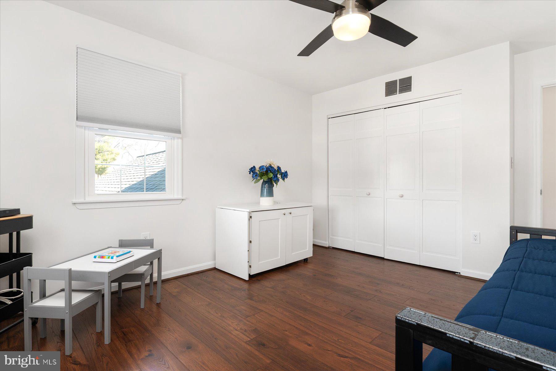 7801 Harle Road Pasadena, MD 21122 - Photo 43 of 64 a living room with wooden floor and furniture