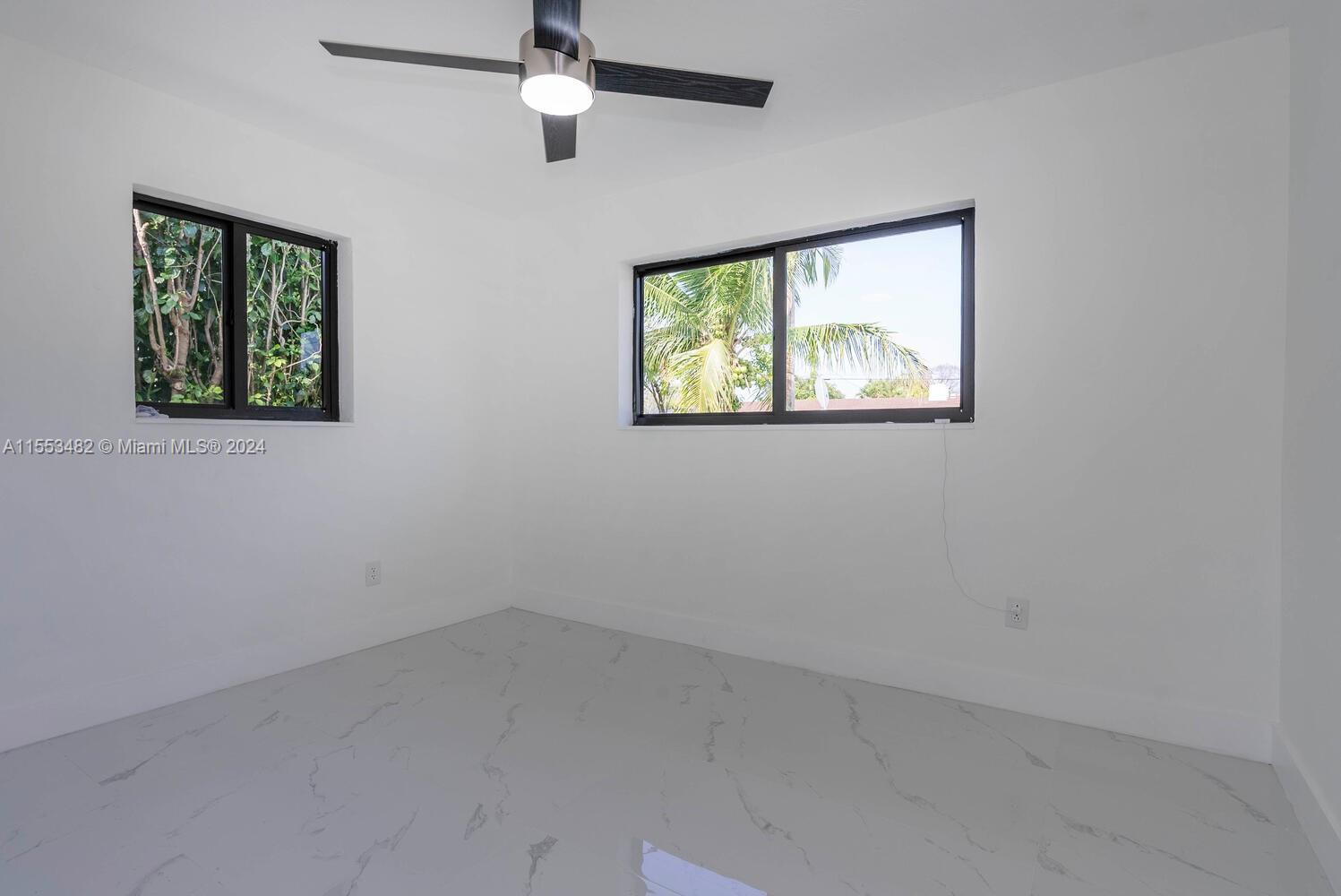 12601 Southwest 84th Avenue Road Miami, FL 33156 - Photo 21 of 40 Bedroom 2 with natural light over the two windows