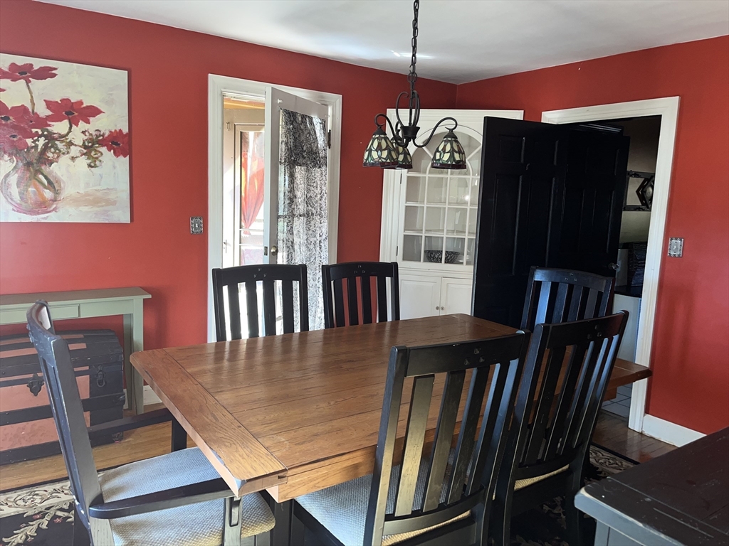 112 Chestnut Street Southbridge, MA 01550 - Photo 12 of 32 a view of a dining room with furniture window and wooden floor