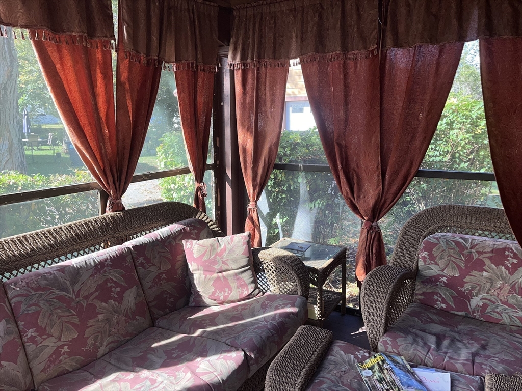 112 Chestnut Street Southbridge, MA 01550 - Photo 13 of 32 a outdoor living space with furniture and a potted plant