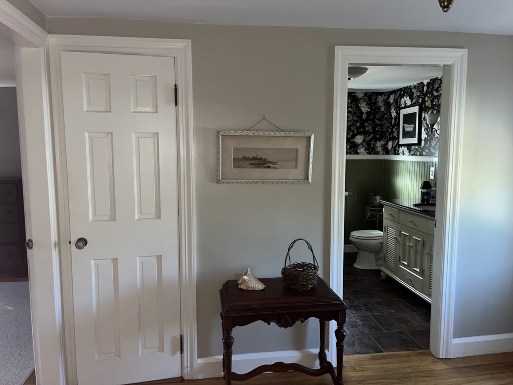 112 Chestnut Street Southbridge, MA 01550 - Photo 15 of 32 a view of a workspace room with furniture and wooden floor