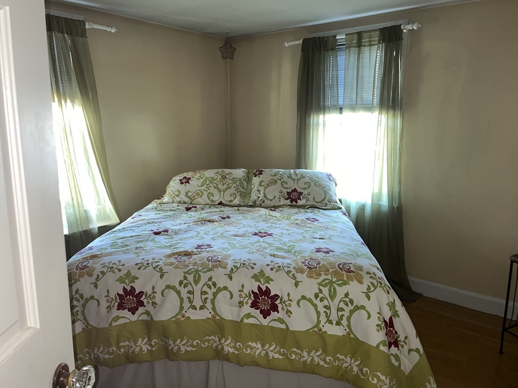 112 Chestnut Street Southbridge, MA 01550 - Photo 17 of 32 a bedroom with a bed and a window