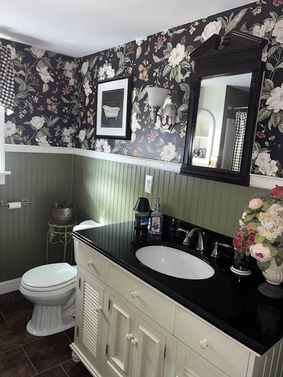 112 Chestnut Street Southbridge, MA 01550 - Photo 19 of 32 a bathroom with a sink toilet and mirror