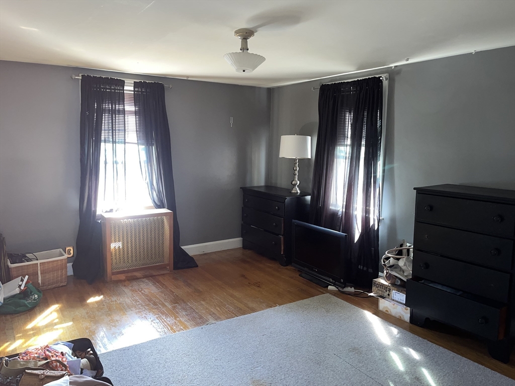 112 Chestnut Street Southbridge, MA 01550 - Photo 22 of 32 a bedroom with a bed and window