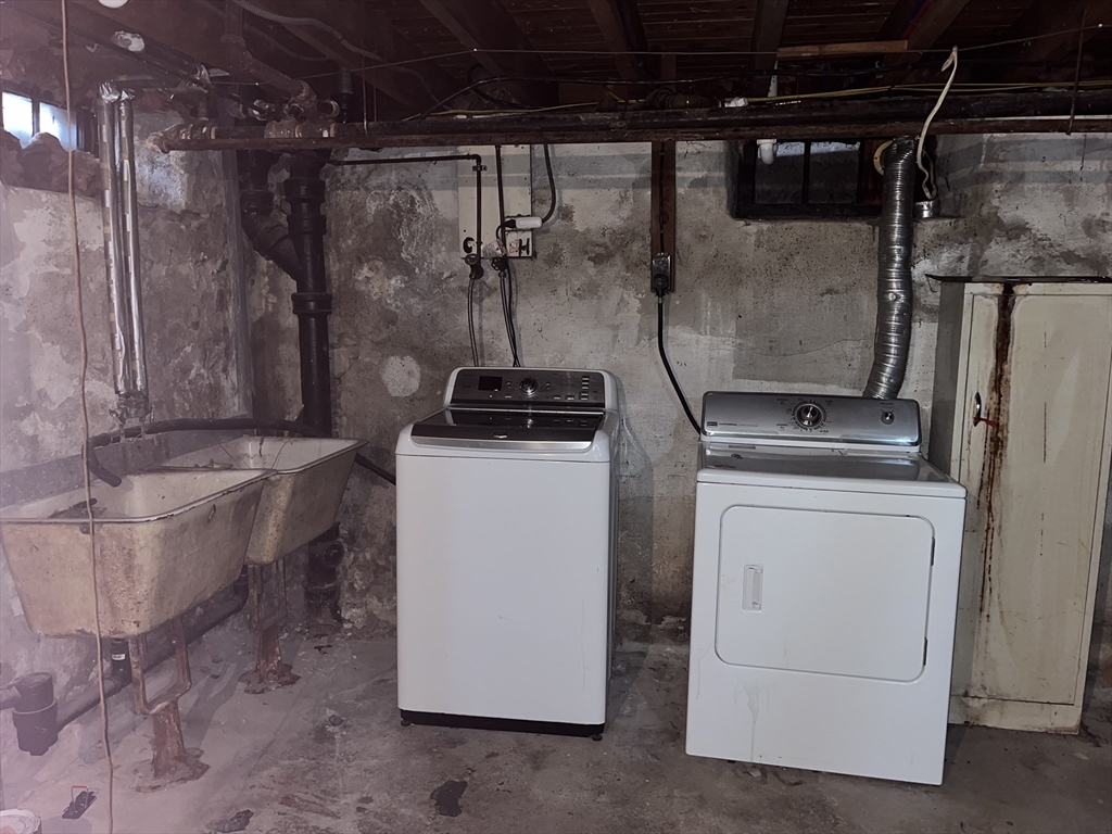 112 Chestnut Street Southbridge, MA 01550 - Photo 24 of 32 a utility room with dryer and washer