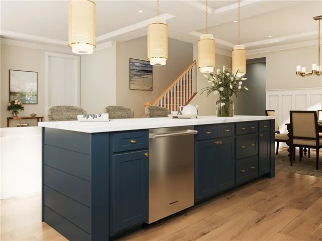 a room with a sink and cabinets