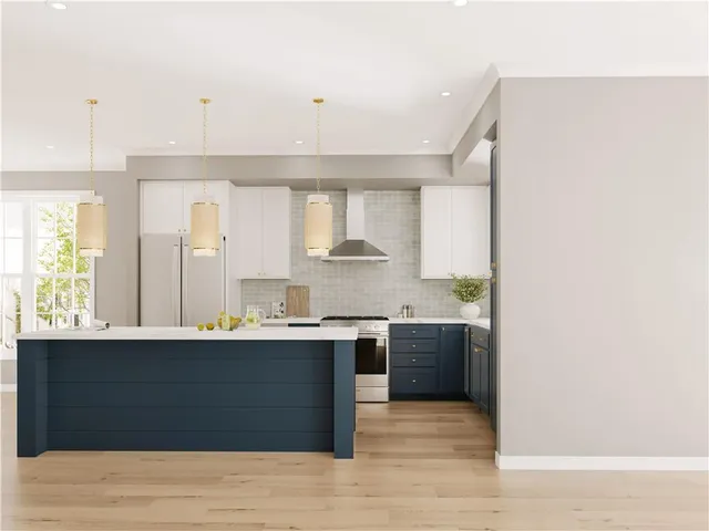 a kitchen with stainless steel appliances granite countertop a sink and cabinets