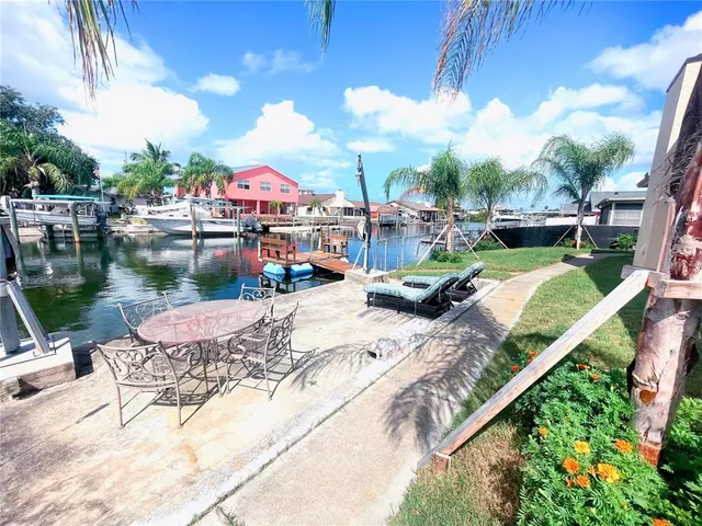 a view of a lake with a house