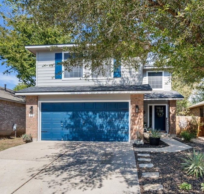 1504 Sleepytime Trail Pflugerville, TX 78660 - Photo 1 of 1 a front view of a house with a yard and garage