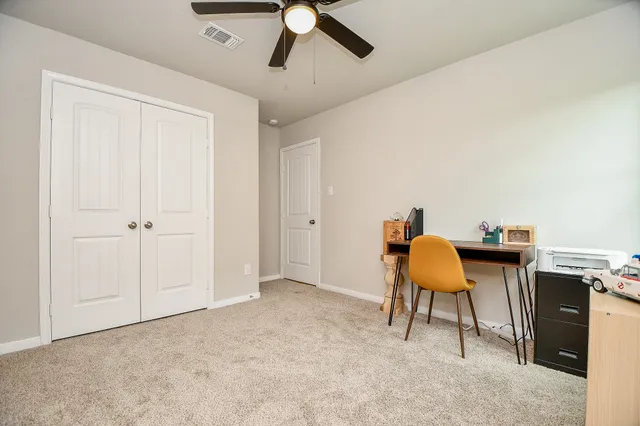 a workspace with a desk and chair