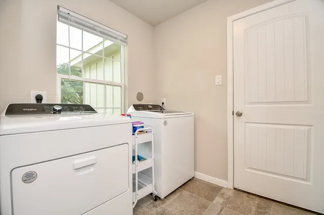 a room with dryer and washer
