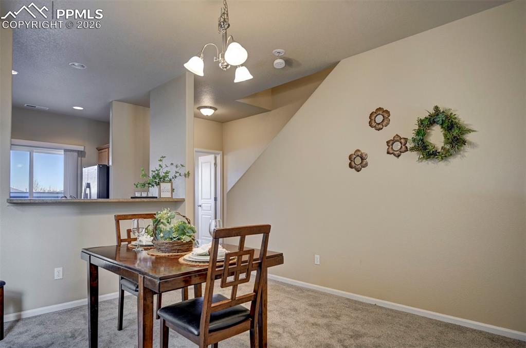 5653 Saint Patrick View Colorado Springs, CO 80923 - Photo 11 of 43 Spacious dining room to eat and entertain in.