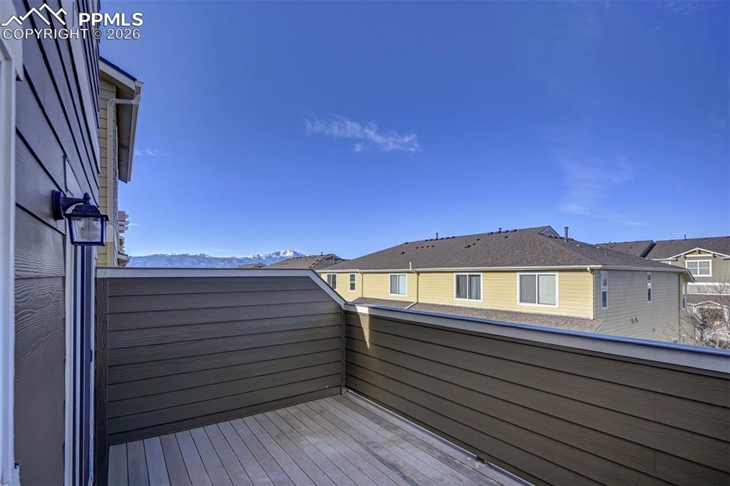 5653 Saint Patrick View Colorado Springs, CO 80923 - Photo 18 of 43 Easy access from kitchen to balcony.
