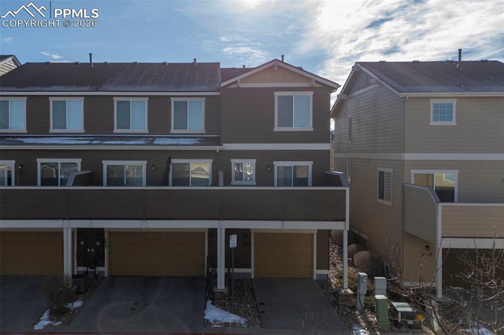 5653 Saint Patrick View Colorado Springs, CO 80923 - Photo 39 of 43 Covered parking going into attached garage.