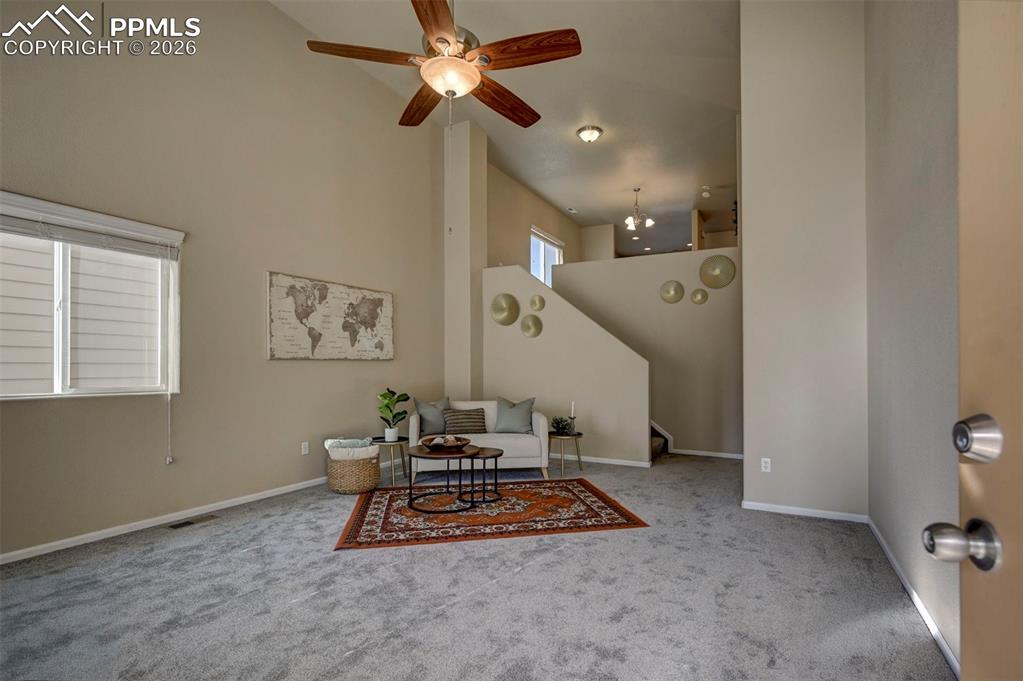5653 Saint Patrick View Colorado Springs, CO 80923 - Photo 7 of 43 Living room is spacious and bright.