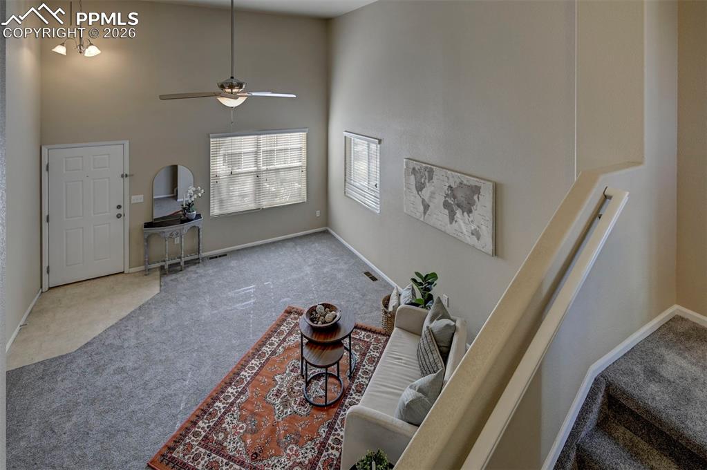 5653 Saint Patrick View Colorado Springs, CO 80923 - Photo 10 of 43 Looking down from dinning area to living room.