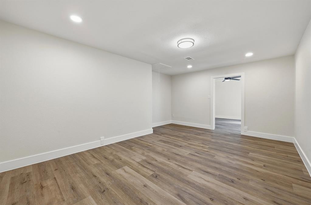 1016 Calcutta Street Hurst, TX 76053 - Photo 24 of 34 wooden floor in an empty room
