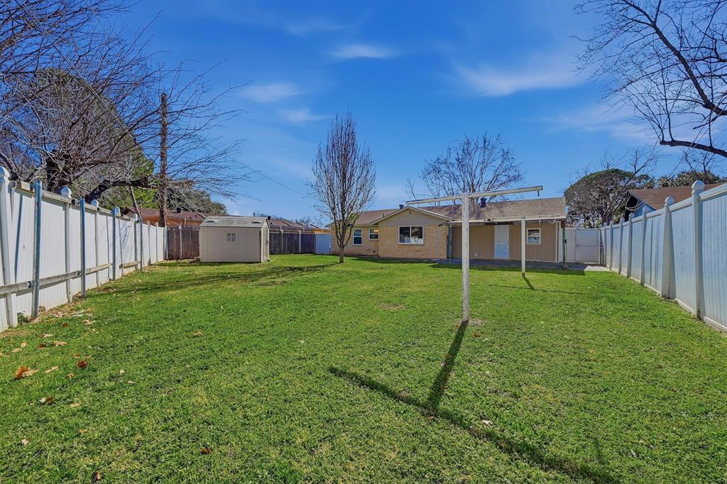 1016 Calcutta Street Hurst, TX 76053 - Photo 32 of 34 a view of a house with backyard and porch