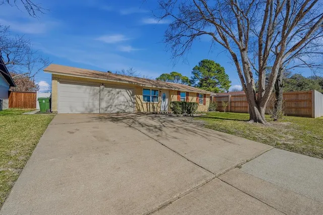 front view of house with a yard