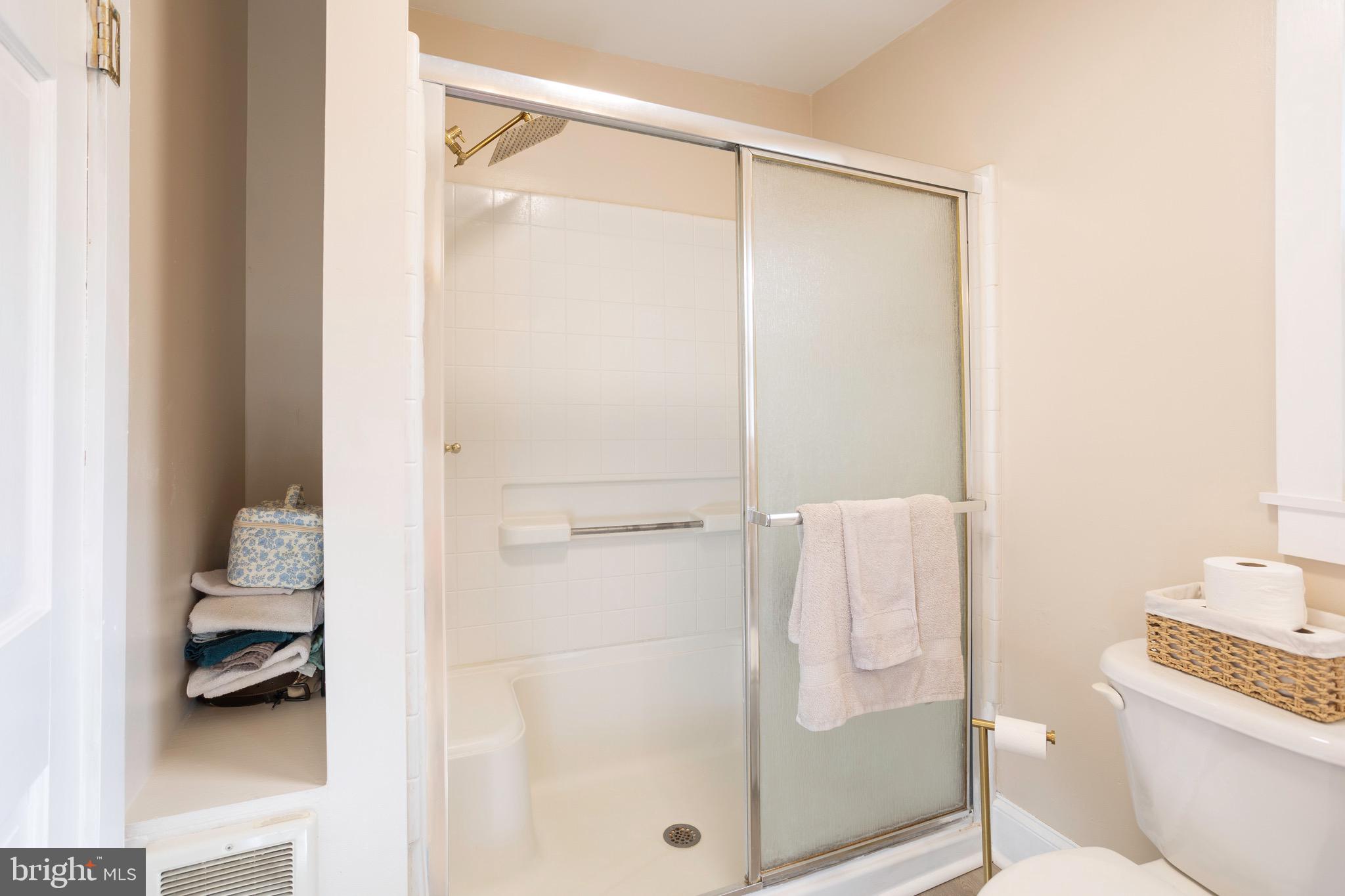 529 North 6th Street Denton, MD 21629 - Photo 12 of 21 a bathroom with a tub and shower
